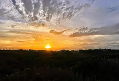 Blick auf den Sonnenuntergang/Sonnenaufgang von der Ferienwohnung aus oder aus der Nähe
