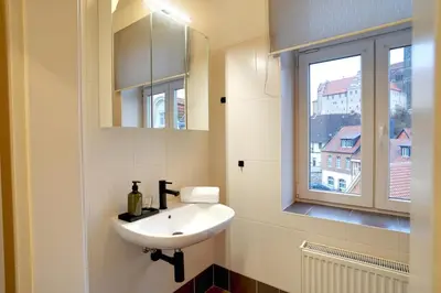 Ein Badezimmer in der Unterkunft Ferienwohnungen Schlossblick - Free Parking