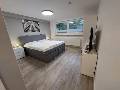 Ein Bett oder Betten in einem Zimmer der Unterkunft Ferienwohnung Weitblick 1