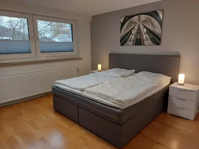 Ein Bett oder Betten in einem Zimmer der Unterkunft Ferienwohnung Weitblick 1