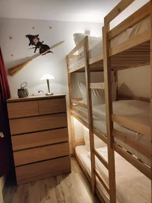 Ein Bett oder Betten in einem Zimmer der Unterkunft Apartment Hexenstube - traumhafter Ausblick & Pool
