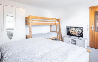 Ein Bett oder Betten in einem Zimmer der Unterkunft Zur Kleinen Hummel