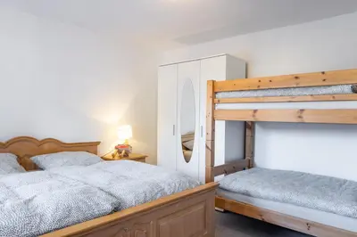 Ein Bett oder Betten in einem Zimmer der Unterkunft Zur Kleinen Hummel