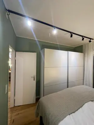 Ein Bett oder Betten in einem Zimmer der Unterkunft Apartment Beletage Bad Harzburg