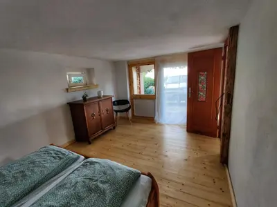 Ein Bett oder Betten in einem Zimmer der Unterkunft Ferienhaus Hans