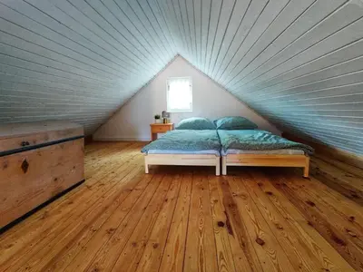 Ein Bett oder Betten in einem Zimmer der Unterkunft Ferienhaus Hans