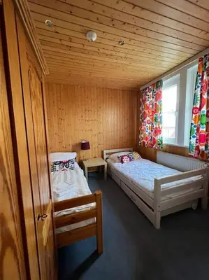 Ein Bett oder Betten in einem Zimmer der Unterkunft Ganze Pension Cecilie für Gruppenreisen