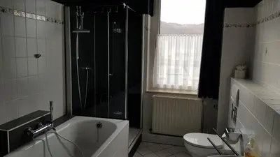 Ein Badezimmer in der Unterkunft ALACARD Ferienwohnungen Höffgen Thale Harz