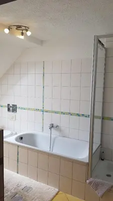 Ein Badezimmer in der Unterkunft ALACARD Ferienwohnungen Höffgen Thale Harz