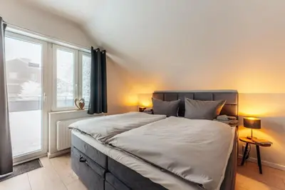 Ein Bett oder Betten in einem Zimmer der Unterkunft Fünf Harzer Berge Bocksberg