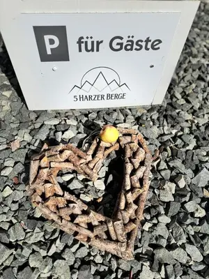 Ein Zertifikat, Auszeichnung, Logo oder anderes Dokument, das in der Unterkunft Fünf Harzer Berge. Rehberg ausgestellt ist