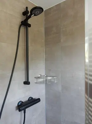 Ein Badezimmer in der Unterkunft Fünf Harzer Berge. Rehberg