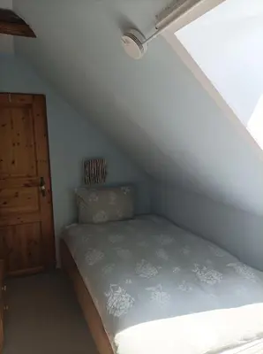 Ein Bett oder Betten in einem Zimmer der Unterkunft Abendrot