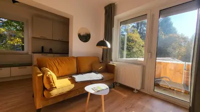 Ein Sitzbereich in der Unterkunft Ferienwohnung Berglodge 11 Hahnenklee Bockswiese