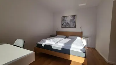 Ein Bett oder Betten in einem Zimmer der Unterkunft Ferienwohnung Berglodge 11 Hahnenklee Bockswiese