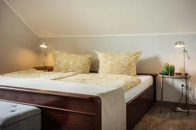 Ein Bett oder Betten in einem Zimmer der Unterkunft HarzBlick 642