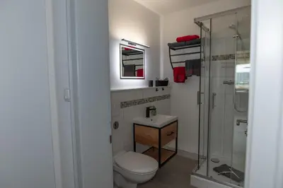 Ein Badezimmer in der Unterkunft HARZsight180