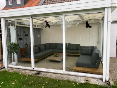 Ein Sitzbereich in der Unterkunft Ferienwohnungen bei der Purpurbuche