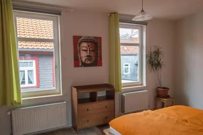 Ein Bett oder Betten in einem Zimmer der Unterkunft Ferienwohnung in der Altstadt von Goslar