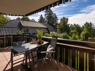 Ein Balkon oder eine Terrasse in der Unterkunft Ferienwohnung am Kurpark