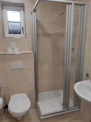 Ein Badezimmer in der Unterkunft Gästehaus Harzklause 4