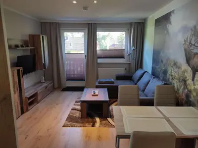 Ein Sitzbereich in der Unterkunft Gästehaus Harzklause 4