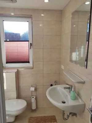 Ein Badezimmer in der Unterkunft Gästehaus Harzklause 7