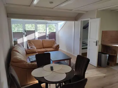 Ein Sitzbereich in der Unterkunft Gästehaus Harzklause 7