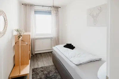 Ein Bett oder Betten in einem Zimmer der Unterkunft Ferienwohnung Brockenblick