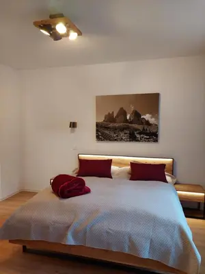 Ein Bett oder Betten in einem Zimmer der Unterkunft Bocksberg-Lodge