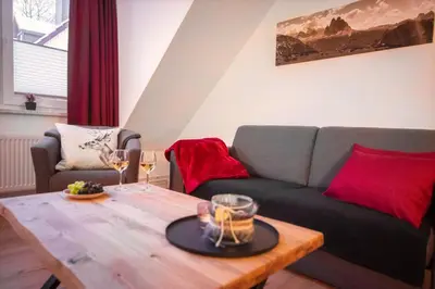Ein Sitzbereich in der Unterkunft Bocksberg-Lodge