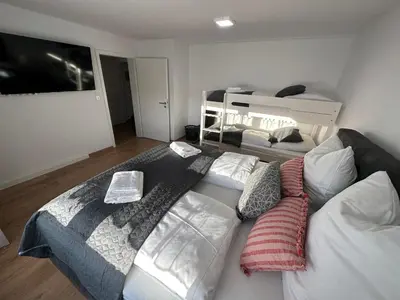 Ein Bett oder Betten in einem Zimmer der Unterkunft TraumFeWo Morgentau #Netflix #Terrasse von Harztraveler