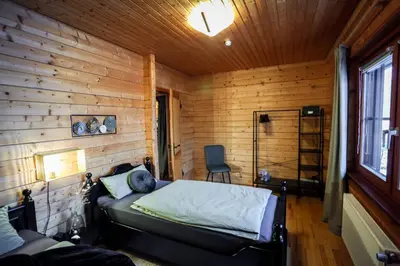 Ein Bett oder Betten in einem Zimmer der Unterkunft Bergfreude Chalet