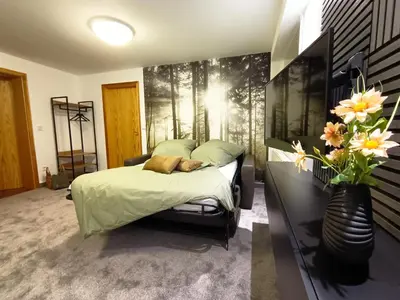 Ein Bett oder Betten in einem Zimmer der Unterkunft Bergfreude Chalet