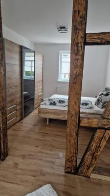 Ein Bett oder Betten in einem Zimmer der Unterkunft Gemütliche Ferienwohnung in Elbingerode/Harz