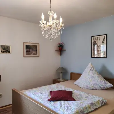 Ein Bett oder Betten in einem Zimmer der Unterkunft Gästehaus Familie Rinke