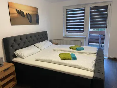 Ein Bett oder Betten in einem Zimmer der Unterkunft Roségold