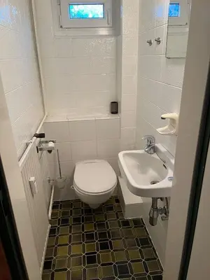 Ein Badezimmer in der Unterkunft Ferienhaus International 2