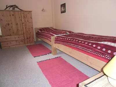 Ein Bett oder Betten in einem Zimmer der Unterkunft Ferienhaus Matti