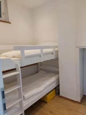 Ein Bett oder Betten in einem Zimmer der Unterkunft Ferienwohnung Harzwunder