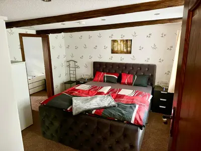 Ein Bett oder Betten in einem Zimmer der Unterkunft Ferienhaus an der “Ilse”