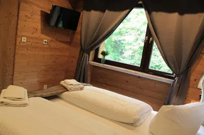 Ein Bett oder Betten in einem Zimmer der Unterkunft Wolfstein - Le Boutique Hotel