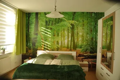 Ein Bett oder Betten in einem Zimmer der Unterkunft Ferienwohnung Wanderfreund