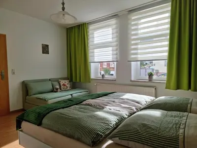 Ein Bett oder Betten in einem Zimmer der Unterkunft Ferienwohnung Wanderfreund