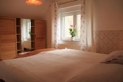 Ein Bett oder Betten in einem Zimmer der Unterkunft Ferienhaus Harzblick