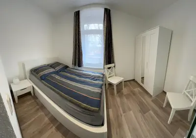 Ein Bett oder Betten in einem Zimmer der Unterkunft Appartement Wolfshagen
