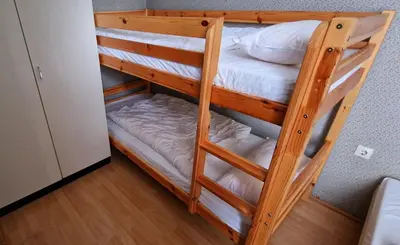 Ein Bett oder Betten in einem Zimmer der Unterkunft Ferienwohnung Müter - Appartement 110