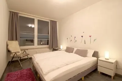 Ein Bett oder Betten in einem Zimmer der Unterkunft Penthouse 383