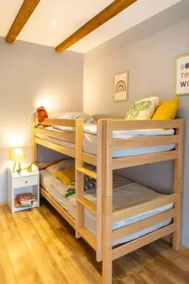 Ein Bett oder Betten in einem Zimmer der Unterkunft Ferienwohnung Harzliebe - am Fuße des Brocken