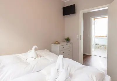 Ein Bett oder Betten in einem Zimmer der Unterkunft Ferienwohnungen am Kornmarkt I